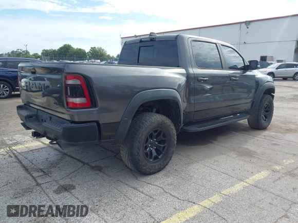 2021 Ram 1500 TRX with VIN 1C6SRFU98MN820577, listed as a IAAI auction lot 42652005 with 43,429 mi miles and . Bid and sale history available at DreamBid. Image 4.