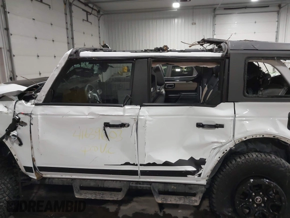 2024 Ford Bronco Wildtrak z VIN 1FMEE2BP9RLA70391, wystawiony jako IAAI lot #41639603 z przebiegiem 11 086 mil mil oraz . Historia ofert i sprzedaży dostępna na DreamBid. Obrazek 14.