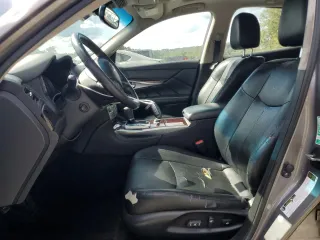 2011 Infiniti M37 with VIN JN1BY1APXBM325191, listed as a Copart auction lot 74209614 with 136,662 mi miles and Salvage Title. Bid and sale history available at carsss.com. Image 7.