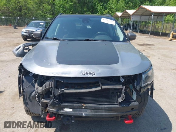 2021 Jeep Compass Trailhawk z VIN 3C4NJDDB7MT590390, wystawiony jako IAAI lot #42163205 z przebiegiem 70 551 mil mil oraz . Historia ofert i sprzedaży dostępna na DreamBid. Obrazek 13.
