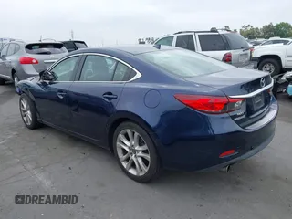 2016 Mazda 6 i Touring z VIN JM1GJ1V50G1401865, wystawiony jako IAAI lot #42334286 z przebiegiem 148 593 mil mil oraz . Historia ofert i sprzedaży dostępna na DreamBid. Obrazek 3.