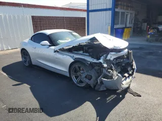 2011 BMW Z4 sDrive35is with VIN WBALM1C54BE633439, listed as a Copart auction lot 60327265 with 112,302 mi miles and Salvage title. Bid and sale history available at DreamBid. Image 4.