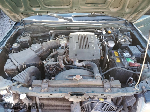 2000 Mitsubishi Montero LS z VIN JA4MT31H0YP015030, wystawiony jako Copart lot #83232584 z przebiegiem 75 294 mil mil oraz Szkoda całkowita • Salvage title. Historia ofert i sprzedaży dostępna na DreamBid. Obrazek 13.