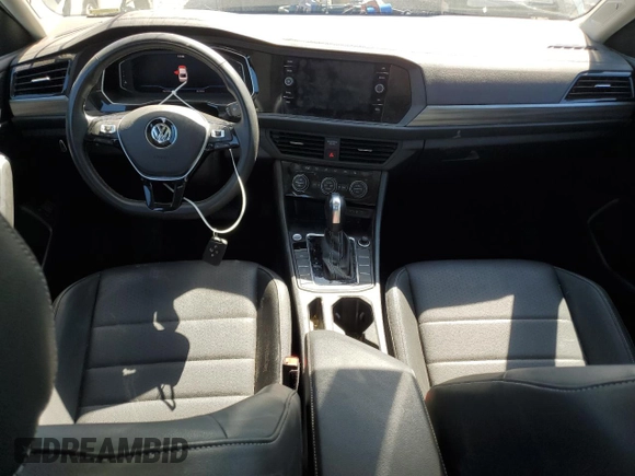 2021 Volkswagen Jetta SEL with VIN 3VWE57BU6MM052524, listed as a Copart auction lot 55524055 with 64,748 mi miles and Salvage title. Bid and sale history available at DreamBid. Image 8.