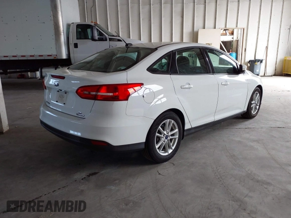 2016 Ford Focus SE with VIN 1FADP3F26GL247657, listed as a IAAI auction lot 42590097 with 37,851 mi miles and . Bid and sale history available at DreamBid. Image 4.