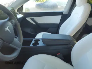 2022 Tesla Model Y Performance with VIN 7SAYGDEF3NF516349, listed as a Copart auction lot 63759245 with Not provided miles and Salvage title. Bid and sale history available at DreamBid. Image 7.