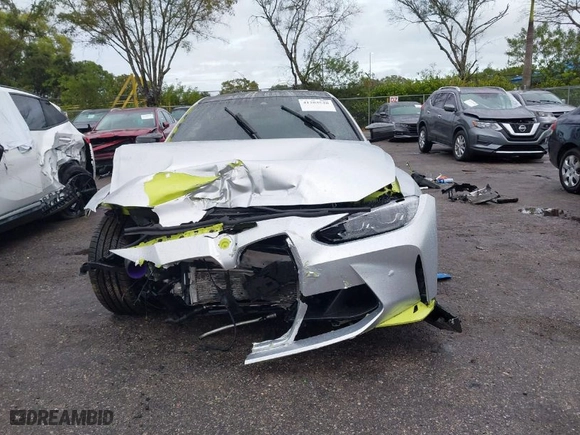 2022 BMW M4 Competition with VIN WBS33AZ04NCJ20184, listed as a IAAI auction lot 41205528 with NaN miles. Bid and sale history available at carsss.com. Image 6.