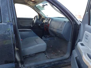 2005 Dodge Dakota SLT with VIN 1D7HW42N95S315558, listed as a IAAI auction lot 41210145 with 207,115 mi miles and . Bid and sale history available at DreamBid. Image 5.