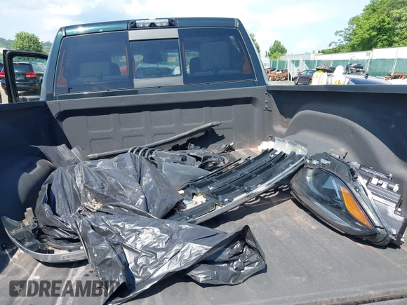2018 Ram 2500 SLT with VIN 3C6TR5DT2JG166397, listed as a IAAI auction lot 42551256 with 100,040 mi miles and . Bid and sale history available at DreamBid. Image 12.