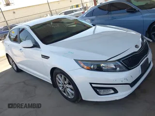 2014 Kia Optima EX z VIN 5XXGN4A77EG335216, wystawiony jako IAAI lot #42228337 z przebiegiem 127 261 mil mil oraz . Historia ofert i sprzedaży dostępna na DreamBid. Obrazek 1.
