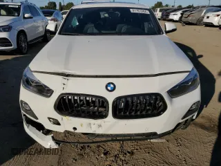2020 BMW X2 xDrive28i with VIN WBXYJ1C02L5P85780, listed as a Copart auction lot 81761284 with 14,451 mi miles and Salvage Title. Bid and sale history available at carsss.com. Image 5.