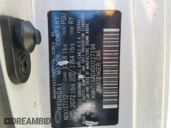 2013 Hyundai Veloster w/Gray Int z VIN KMHTC6ADXDU127194, wystawiony jako Copart lot #51751345 z przebiegiem 122 221 mil mil oraz Szkoda całkowita • Salvage title. Historia ofert i sprzedaży dostępna na DreamBid. Obrazek 12.