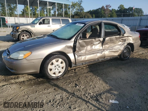 2003 Ford Taurus z VIN 1FAFP52253A170456, wystawiony jako Copart lot #70009824 z przebiegiem 216 567 mil mil oraz Szkoda całkowita • Salvage title. Historia ofert i sprzedaży dostępna na DreamBid. Obrazek 1.
