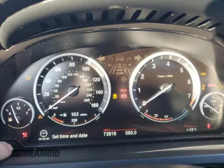 2012 BMW 7 Series with VIN WBAKX8C52CC198431, listed as a Copart auction lot 87894075 with 72,818 mi miles and Clean title. Bid and sale history available at DreamBid. Image 9.
