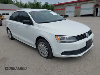 2014 Volkswagen Jetta TDI w/Premium with VIN 3VWLL7AJ3EM330267, listed as a IAAI auction lot 42723462 with 125,000 mi miles and . Bid and sale history available at DreamBid. Image 1.