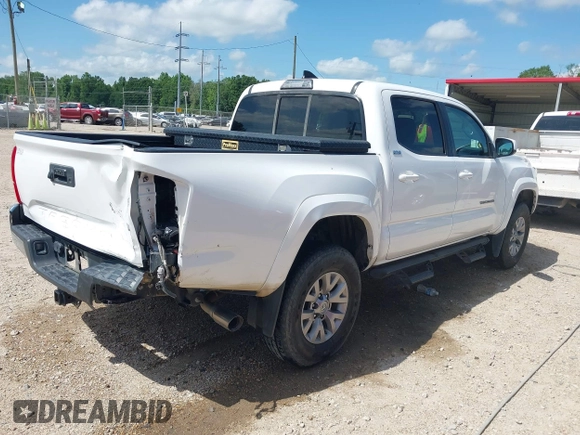 2017 Toyota Tacoma SR5 with VIN 5TFAZ5CN6HX035708, listed as a IAAI auction lot 42117129 with 122,100 mi miles and . Bid and sale history available at DreamBid. Image 4.