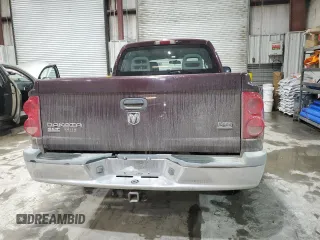 2005 Dodge Dakota SLT z VIN 1D7HW48N85S309502, wystawiony jako Copart lot #44729525 z przebiegiem 126 375 mil mil oraz Szkoda całkowita • Salvage title. Historia ofert i sprzedaży dostępna na DreamBid. Obrazek 6.