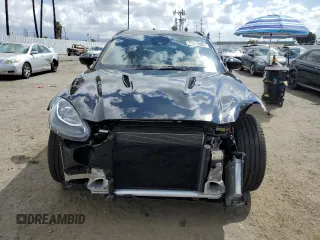 2021 Aston Martin DBX z VIN SCFVUJAW7MTV03341, wystawiony jako Copart lot #71015804 z przebiegiem 12 324 mil mil oraz Szkody całkowita. Historia ofert i sprzedaży dostępna na DreamBid. Obrazek 5.