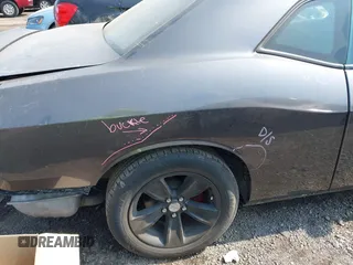 2019 Dodge Challenger SXT с VIN 2C3CDZAG7KH677566, выставлен на аукционе IAAI как лот 42584921 с пробегом 58 374 миль миль и . История ставок и продаж доступна на DreamBid. Изображение 18.