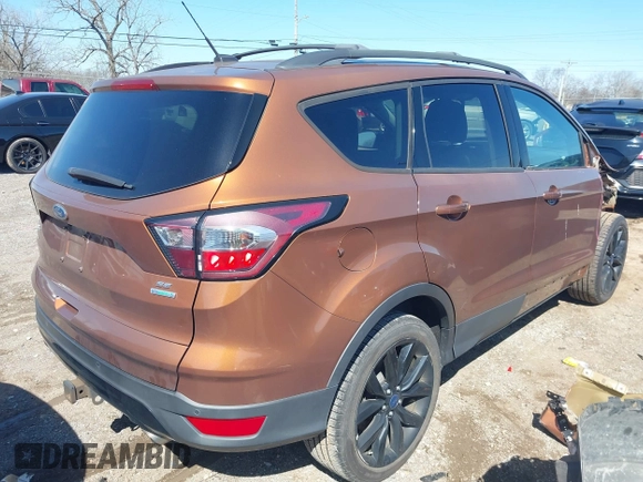 2017 Ford Escape SE with VIN 1FMCU0G97HUB49124, listed as a IAAI auction lot 41775132 with 103,069 mi miles. Bid and sale history available at carsss.com. Image 4.