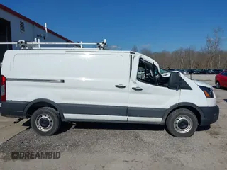 2020 Ford Transit Cargo with VIN 1FTBR1Y8XLKA84383, listed as a IAAI auction lot 41519121 with 61,410 mi miles and . Bid and sale history available at DreamBid. Image 13.