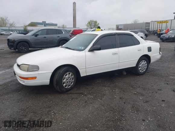 1994 Toyota Camry LE with VIN 4T1SK12E9RU848607, listed as a IAAI auction lot 41972535 with 152,468 mi miles. Bid and sale history available at carsss.com. Image 2.