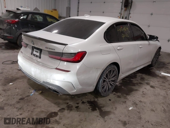 2020 BMW 3 Series M340i xDrive with VIN WBA5U9C08LFJ73063, listed as a IAAI auction lot 41513641 with 52,431 mi miles and . Bid and sale history available at DreamBid. Image 4.