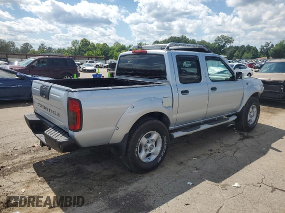 2001 Nissan Frontier SE with VIN 1N6ED27T51C311894, listed as a Copart auction lot 56281465 with 151,361 mi miles and Salvage title. Bid and sale history available at DreamBid. Image 3.