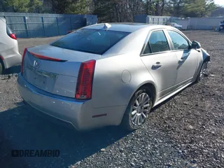 2012 Cadillac CTS Sedan Luxury with VIN 1G6DG5E50C0116725, listed as a IAAI auction lot 41694928 with 114,214 mi miles. Bid and sale history available at carsss.com. Image 4.