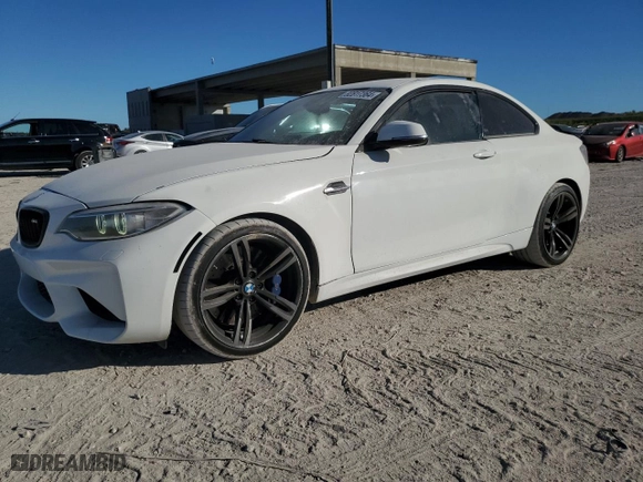2017 BMW M2 with VIN WBS1H9C57HV786427, listed as a Copart auction lot 82817364 with 57,991 mi miles and Clean Title. Bid and sale history available at carsss.com. Image 1.