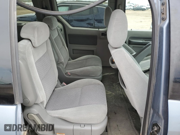 2004 Ford Freestar SEL z VIN 2FMZA52274BB08535, wystawiony jako Copart lot #53969625 z przebiegiem 129 043 mil mil oraz Czysty tytuł • Clean title. Historia ofert i sprzedaży dostępna na DreamBid. Obrazek 10.