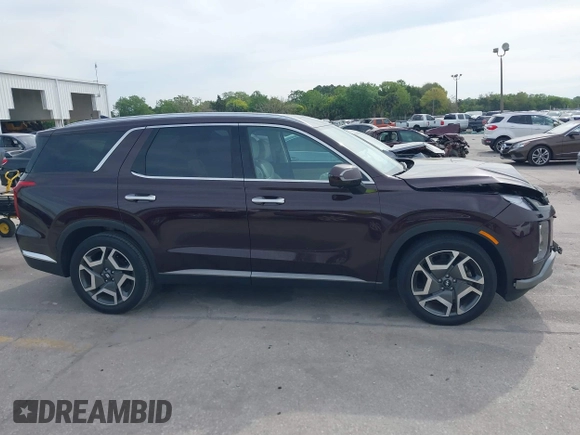 2023 Hyundai Palisade Limited z VIN KM8R54GE0PU517573, wystawiony jako IAAI lot #41870400 z przebiegiem 11 477 mil mil oraz . Historia ofert i sprzedaży dostępna na DreamBid. Obrazek 13.