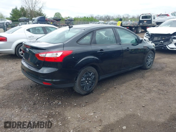 2012 Ford Focus SE with VIN 1FAHP3F27CL112277, listed as a IAAI auction lot 42053243 with 104,885 mi miles. Bid and sale history available at carsss.com. Image 4.