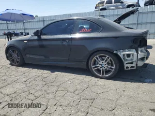 2011 BMW 1 Series 135i with VIN WBAUC9C59BVM10528, listed as a Copart auction lot 61499025 with 160,557 mi miles and Salvage title. Bid and sale history available at DreamBid. Image 2.