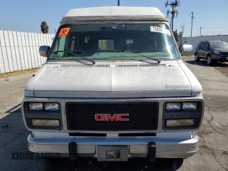 1994 GMC Vandura z VIN 1GDEG25KXRF519134, wystawiony jako Copart lot #75056124 z przebiegiem 245 597 mil mil oraz Szkody całkowita. Historia ofert i sprzedaży dostępna na DreamBid. Obrazek 5.
