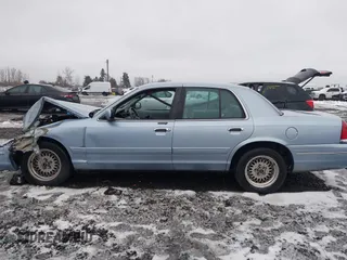 1998 Ford Crown Victoria LX с VIN 2FAFP74W4WX100549, выставлен на аукционе IAAI как лот 41573494 с пробегом 114 818 миль миль и . История ставок и продаж доступна на DreamBid. Изображение 14.