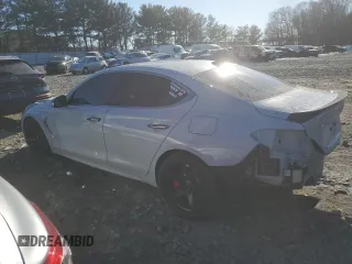 2019 Genesis G70 3.3T Advanced with VIN KMTG34LE4KU014808, listed as a Copart auction lot 87353044 with 57,050 mi miles and Salvage Title. Bid and sale history available at carsss.com. Image 2.