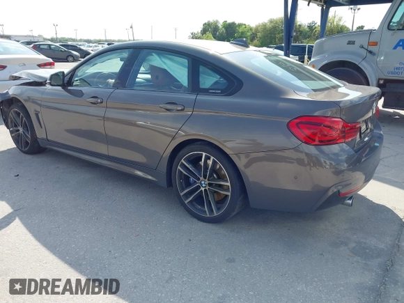 2018 BMW 4 Series 440i with VIN WBA4J5C54JBF07315, listed as a IAAI auction lot 41738540 with 74,577 mi miles and . Bid and sale history available at DreamBid. Image 3.