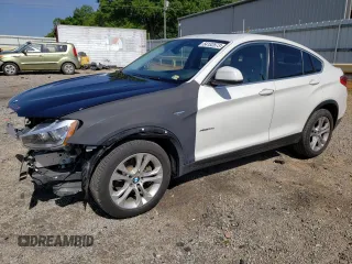 2015 BMW X4 xDrive28i with VIN 5UXXW3C57F0M88277, listed as a Copart auction lot 61388634 with 110,962 mi miles and Salvage title. Bid and sale history available at DreamBid. Image 1.