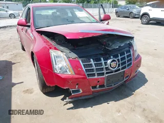 2012 Cadillac CTS Premium with VIN 1G6DS5E34C0132696, listed as a IAAI auction lot 42562931 with 83,025 mi miles and . Bid and sale history available at DreamBid. Image 6.