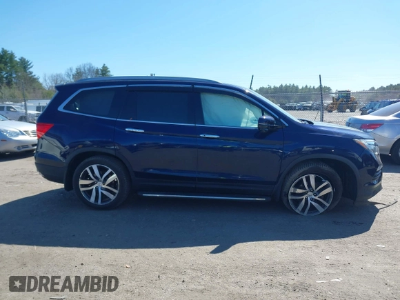 2017 Honda Pilot Touring with VIN 5FNYF6H98HB020341, listed as a IAAI auction lot 42037156 with 73,511 mi miles and . Bid and sale history available at DreamBid. Image 13.