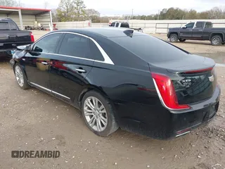 2018 Cadillac XTS Luxury with VIN 2G61M5S31J9135706, listed as a IAAI auction lot 41572396 with 140,539 mi miles. Bid and sale history available at carsss.com. Image 3.