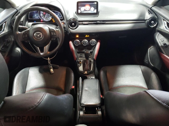 2017 Mazda CX-3 Grand Touring z VIN JM1DKFD70H0148182, wystawiony jako Copart lot #59032435 z przebiegiem 70 166 mil mil oraz Szkoda całkowita • Salvage title. Historia ofert i sprzedaży dostępna na DreamBid. Obrazek 8.