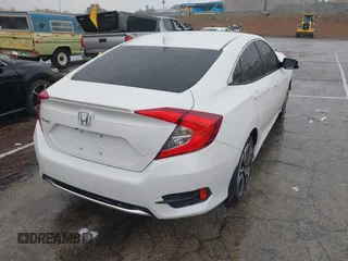 2020 Honda Civic EX-L with VIN 19XFC1F7XLE208720, listed as a IAAI auction lot 41725235 with 70,794 mi miles and . Bid and sale history available at DreamBid. Image 4.
