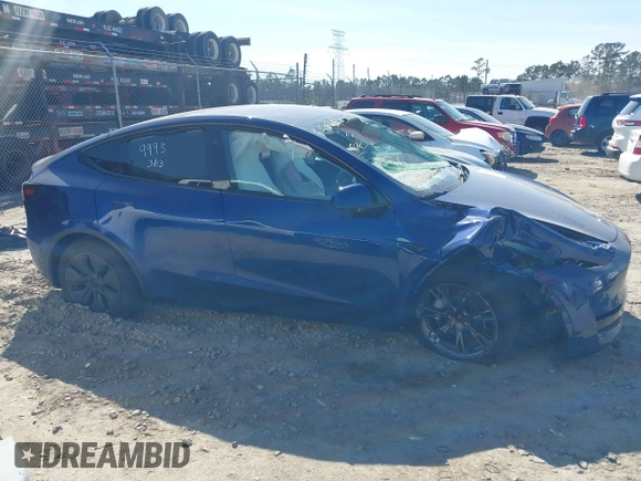 2025 Tesla Model Y Long Range with VIN 7SAYGDEEXSA346006, listed as a IAAI auction lot 41835610 with 1,896 mi miles and . Bid and sale history available at carsss.com. Image 13.