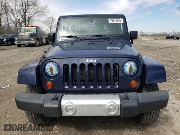 2013 Jeep Wrangler Sahara with VIN 1C4AJWBG3DL516842, listed as a Copart auction lot 49246065 with 129,594 mi miles and Salvage title. Bid and sale history available at DreamBid. Image 5.