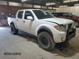 2009 Nissan Frontier SE with VIN 1N6AD07WX9C419890, listed as a Copart auction lot 47766455 with 128,939 mi miles and Salvage title. Bid and sale history available at DreamBid. Image 4.