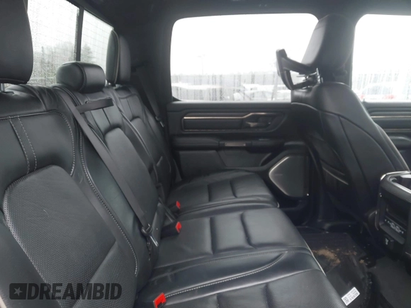 2021 Ram 1500 Limited with VIN 1C6SRFHT3MN500590, listed as a IAAI auction lot 41117602 with 81,875 mi miles and . Bid and sale history available at DreamBid. Image 8.