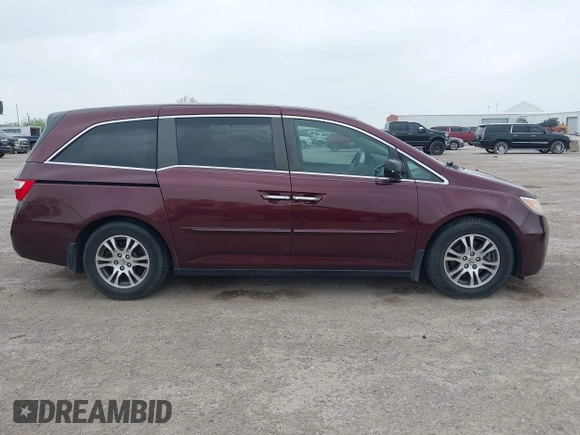 2012 Honda Odyssey EX-L with VIN 5FNRL5H61CB108301, listed as a IAAI auction lot 41939536 with 225,476 mi miles and . Bid and sale history available at DreamBid. Image 13.