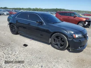 2013 Chrysler 300 SRT-8 with VIN 2C3CCAFJ9DH731557, listed as a Copart auction lot 69700344 with 174,242 mi miles and Salvage Title. Bid and sale history available at DreamBid. Image 4.